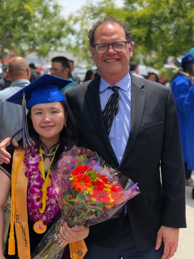 Valedictorian Shuxin Zhao and Principal Kibby Kleiman after the 2018 PVHS graduation ceremony.