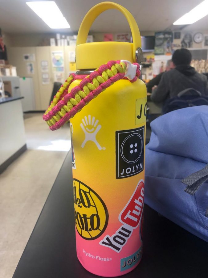 Kayla Collins hydro flask (photo by Maliyah Hart) Special Edition Pink and Yellow Ombre Hydro flask