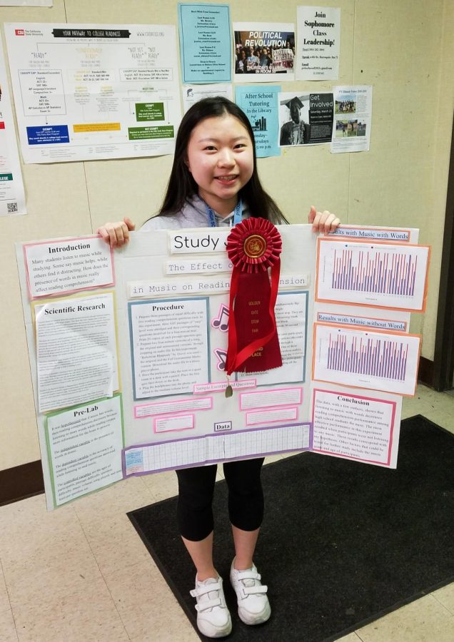 Pinole+Valley+High+School+senior+Anna+Chang+with+her+award-winning+Science+Fair+project.+