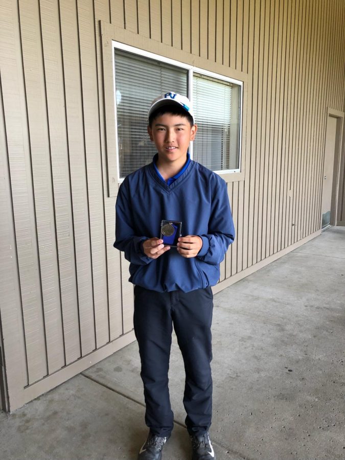 Tyler Momono with his TCAL Championship Medal. Next stop: NCS.