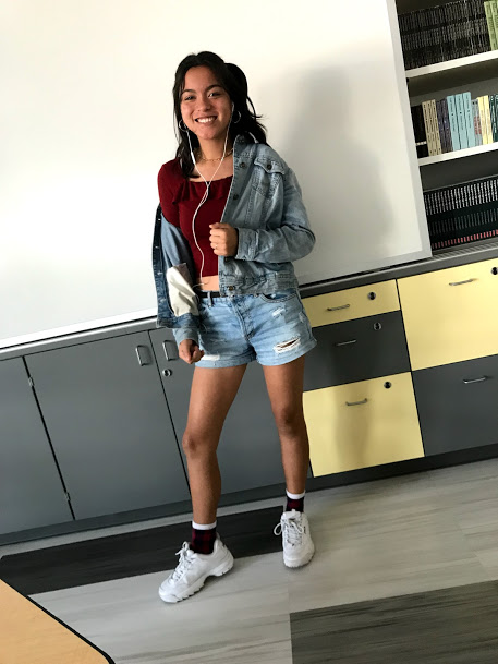 Marissa Espinoza (21) showing off the double denim trend from the 90s