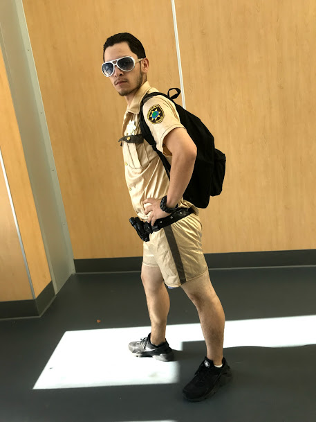 Manny Molina (20) posing like a real police officer.