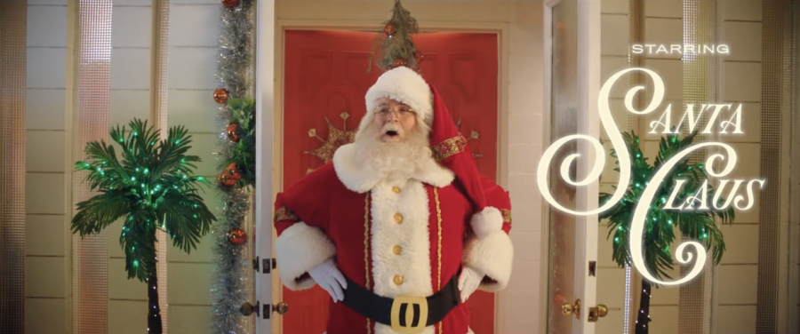 Santa Claus entering Katy Perrys house.