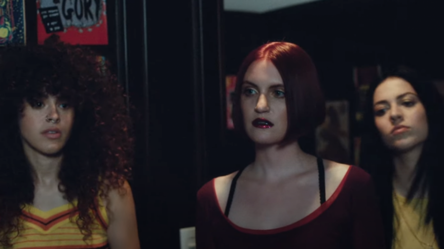 The members of MUNA; (from left to right); Naomi McPherson, Katie Gavin, and Josette Maskin in the music video for Stayaway.