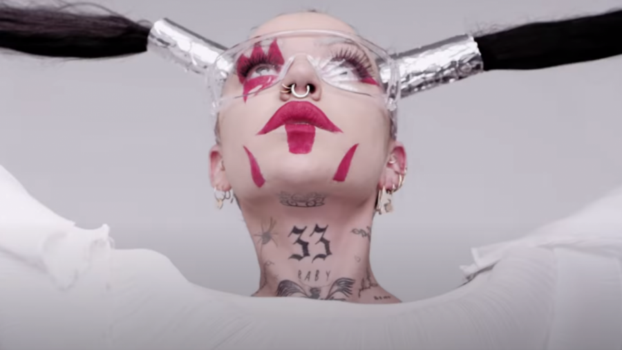Candy in the music video for “XXXTC”.